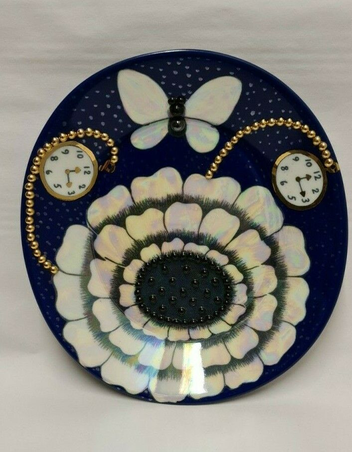 Read more about the article Birger Kaipiainen Lustre Blue Clocks Pearl Decorated Art Plate Finland Arabia