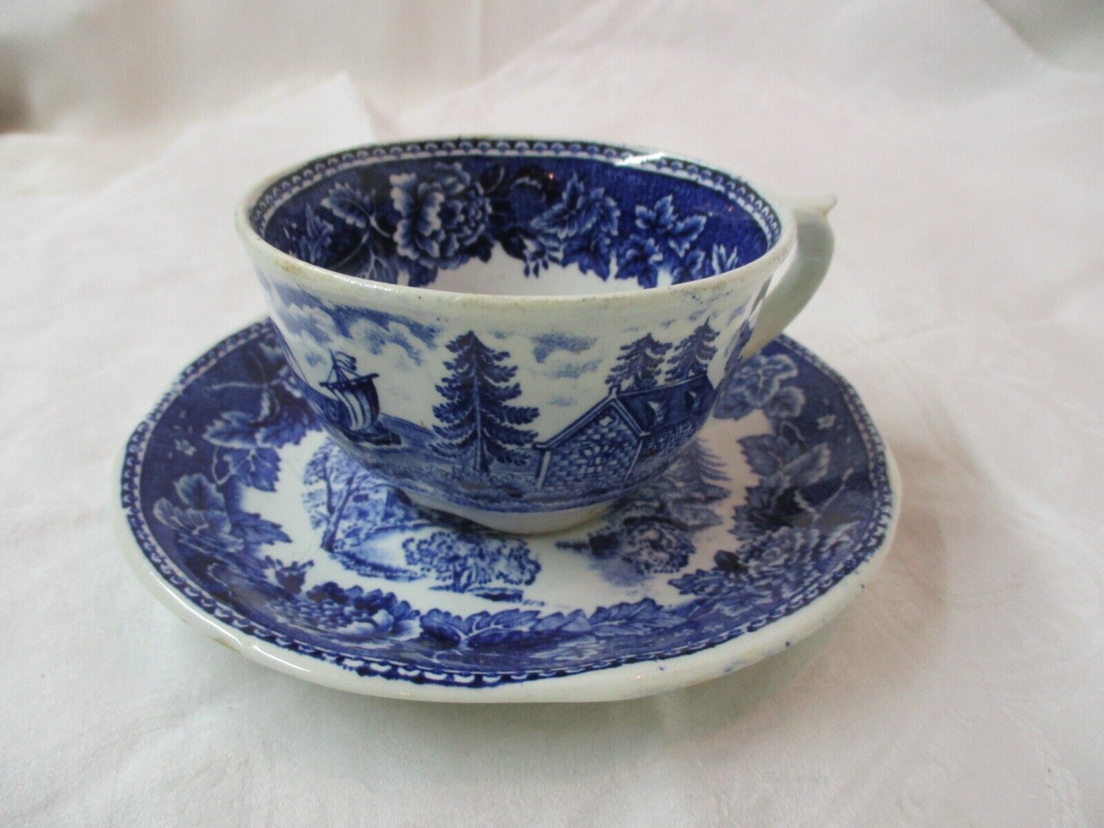 Read more about the article Vintage Finland Arabia Supomi blue and white Cup and Saucer Blue Landscape