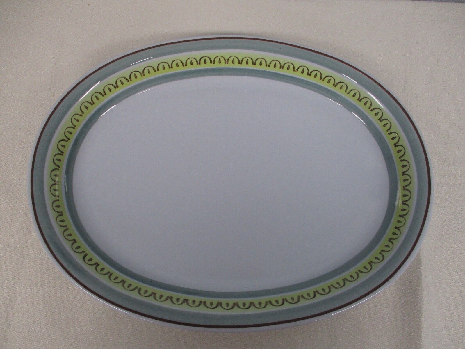 Read more about the article MID CENTURY MODERN ARABIA CROWN BAND 14 1/2″ OVAL SERVING PLATTER