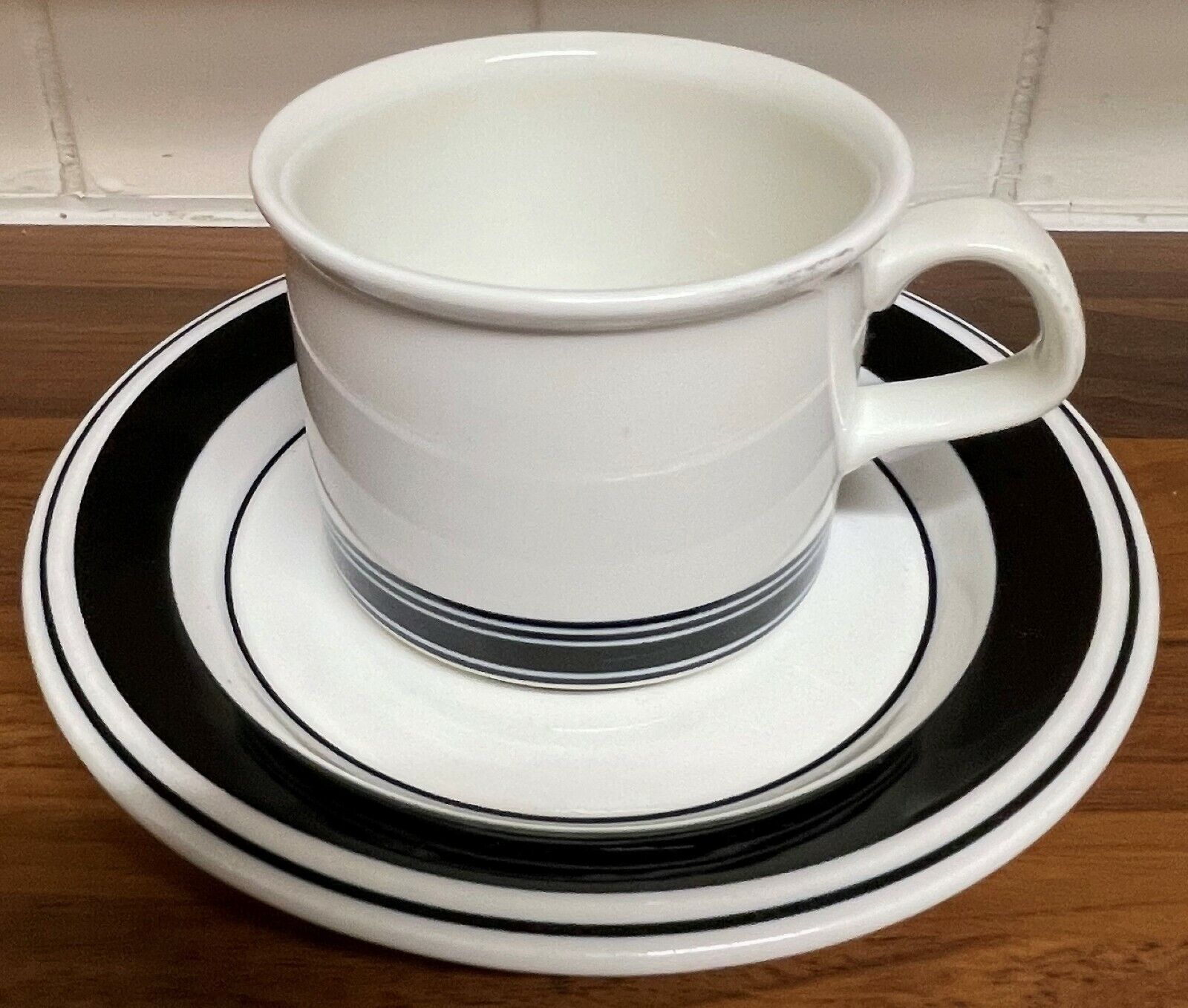 Read more about the article Arabia Finland Faenza Cup and Saucer Tea Black Stripe Peter Winquist