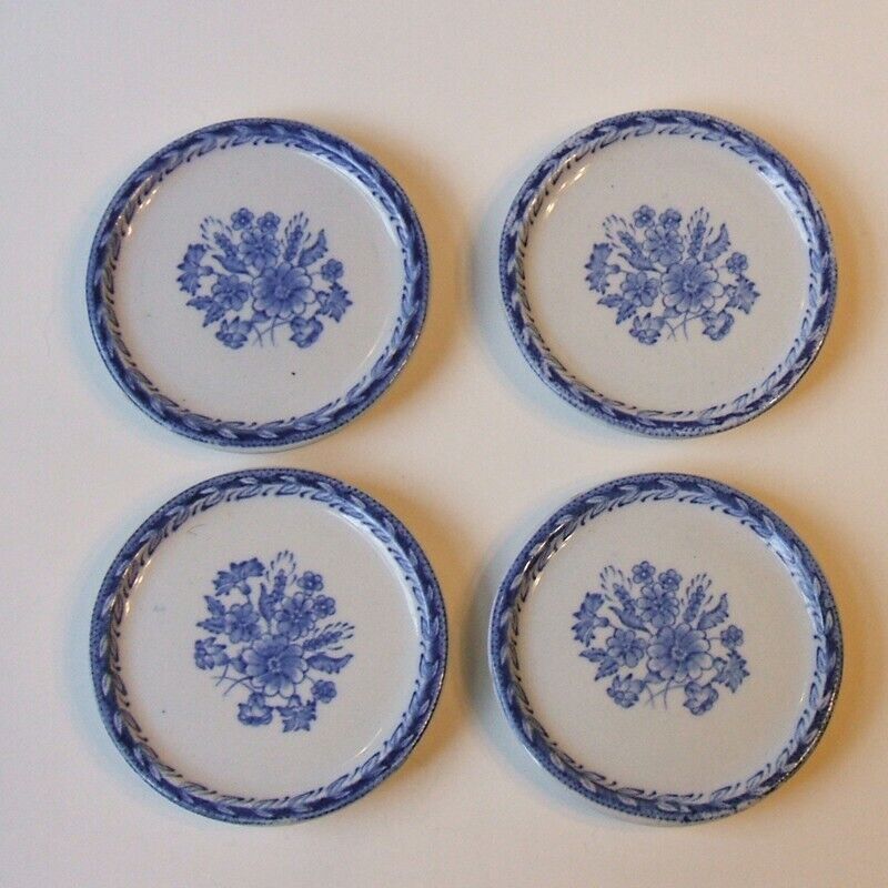 Read more about the article Arabia Finland Finn Flower Blue Four 3.25 Inch Wall Plaques / Butter Pats