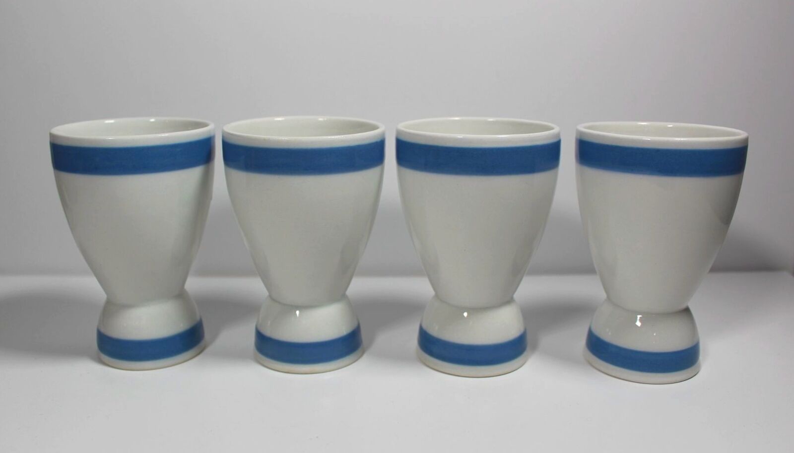 Read more about the article Set of 4 ARABIA of FINLAND Ribbons Blue Double Egg Cups 4 1/8″