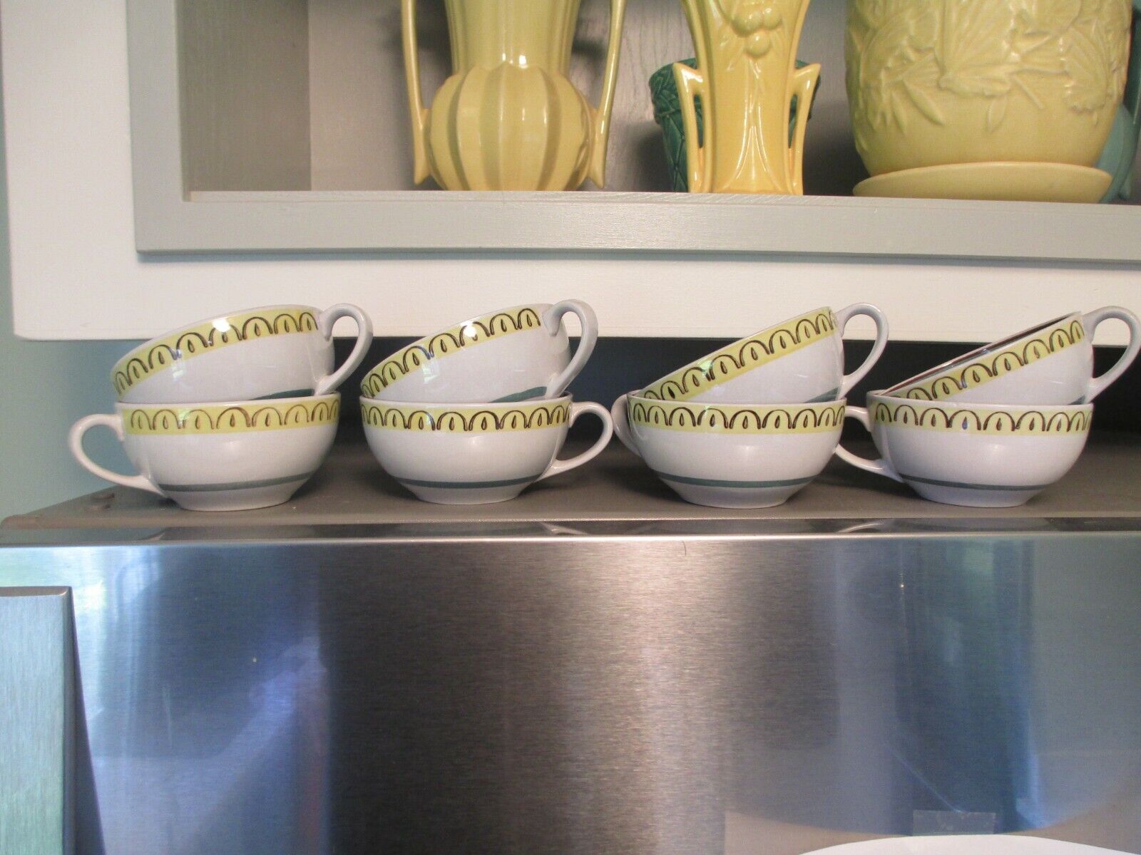 Read more about the article ARABIA FINLAND CROWN BAND COFFEE CUPS SET OF 8