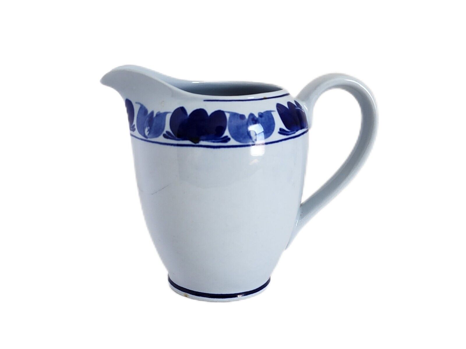 Read more about the article Arabia Finland Green Laurel Pottery Pitcher Handpainted Blue’s Flower Boarder