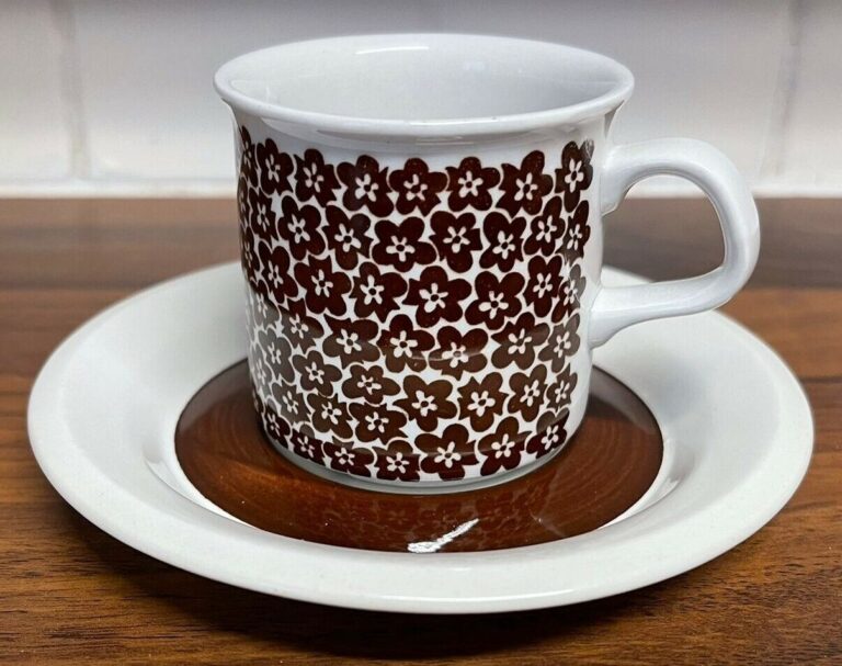 Read more about the article Arabia Faenza Cup and Saucer Little Brown Flowers Inkeri Leivo Arabia Finland