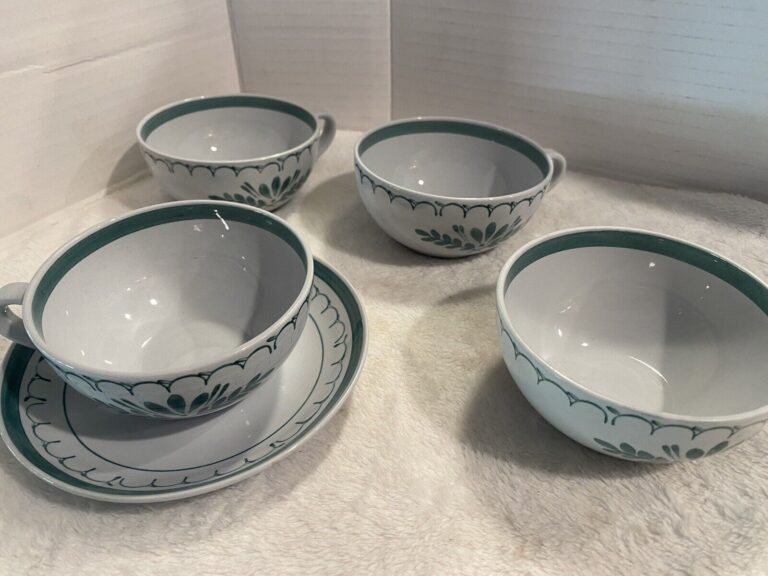 Read more about the article 4 ARABIA FINLAND GREEN THISTLE HAND PAINTED CUPS AND 1 SAUCER