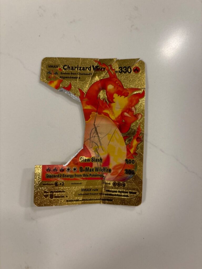 Read more about the article Chocolate Condition Snowflake Cut Golden Charizard Vmax Fragment (Degrade/PSA-2)