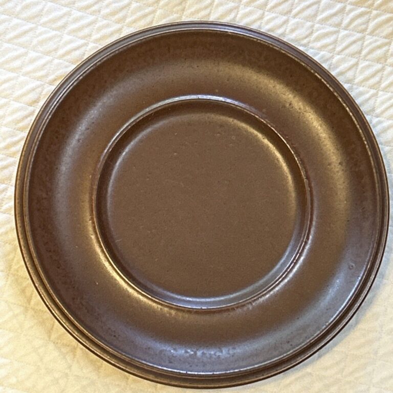 Read more about the article Arabia Ruska Finland Saucers Dark Brown Stoneware