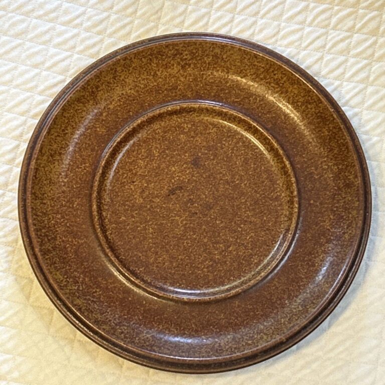 Read more about the article Arabia Ruska Finland Saucers Dark Brown Stoneware