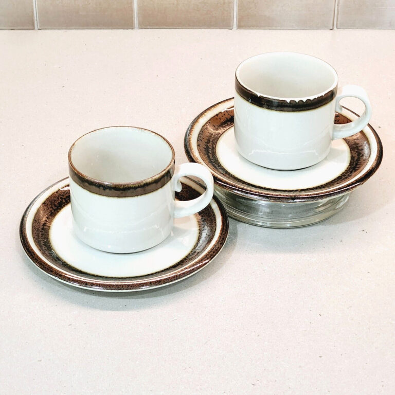 Read more about the article Arabia Finland Karelia Cup and Saucer Cream Brown Black Bands Stoneware (Lot of 2)