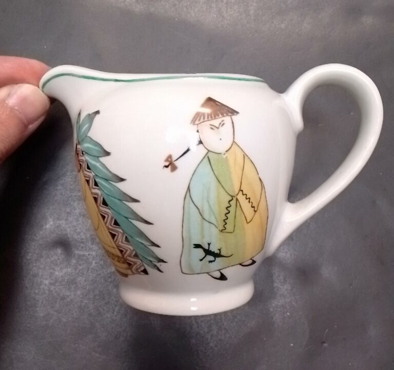 Read more about the article Salvage Chipped Arabia Finland Parade People Of The World Childs Creamer 1960s