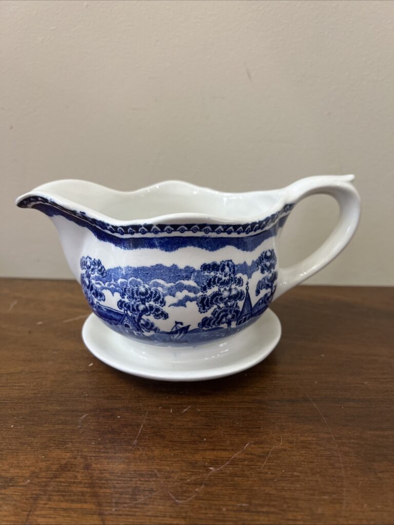 Read more about the article Arabia of Finland Landscape Gravy Boat w/attached Underplate ~ Blue and White