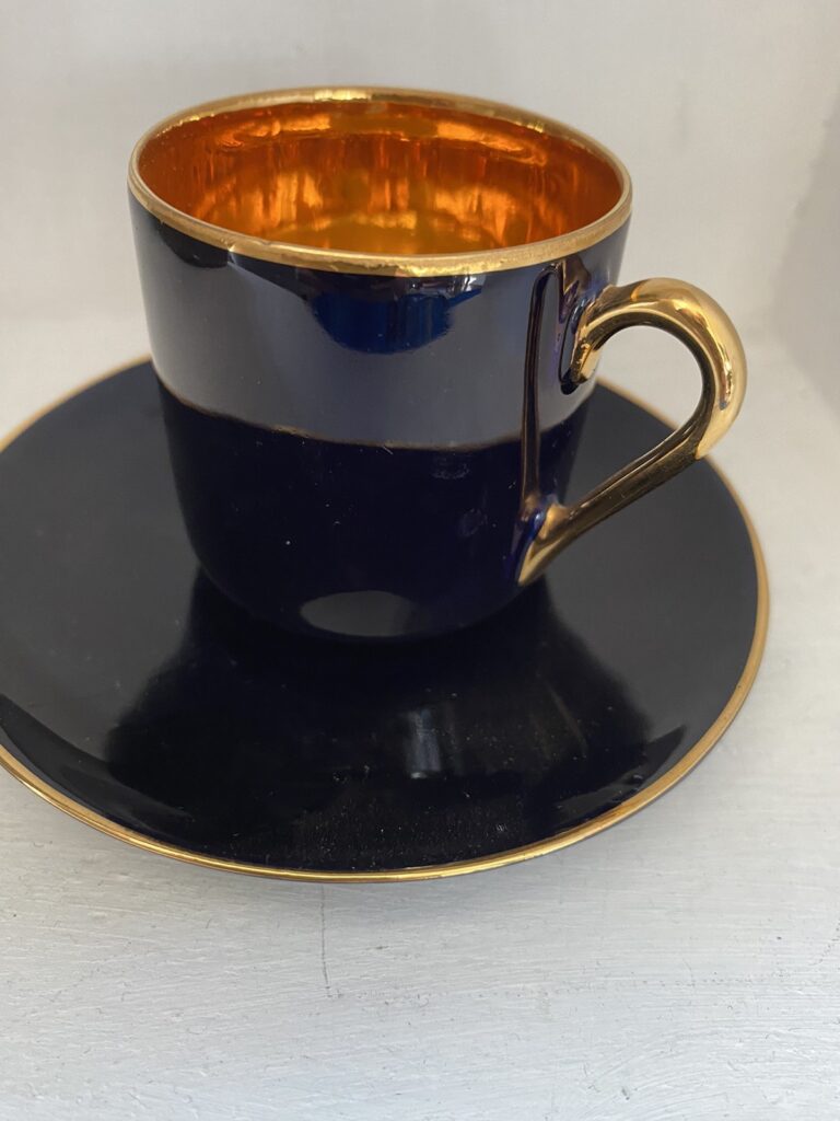 Read more about the article Arabia Finland Demitasse Cup Saucer gold cobalt blue